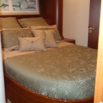 Owners Quarters featuring the beautiful Teak found in a Merritt Yacht